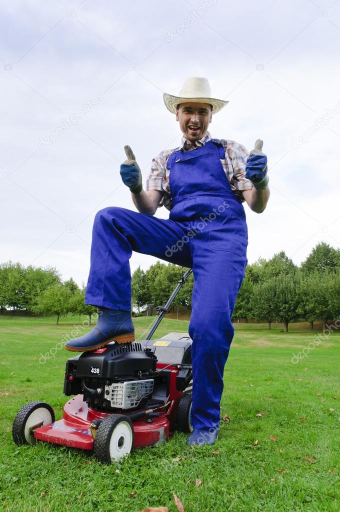 Gardening, man mowing the lawn