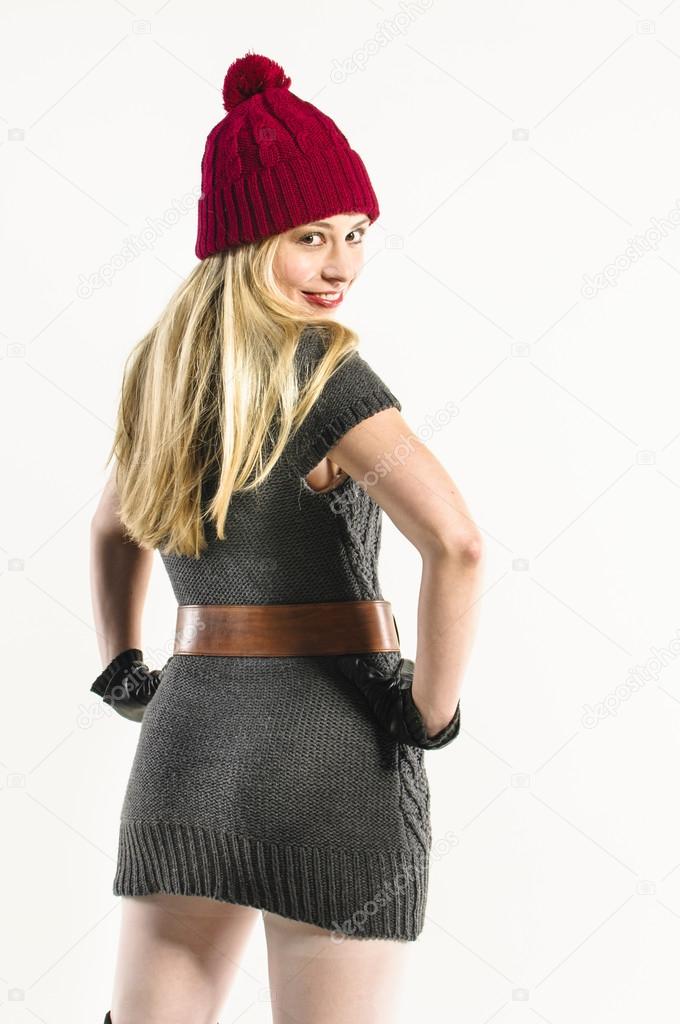 Blond girl with red wool hat