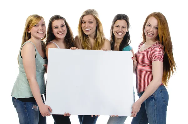 Girls with billboard — Stock Photo, Image