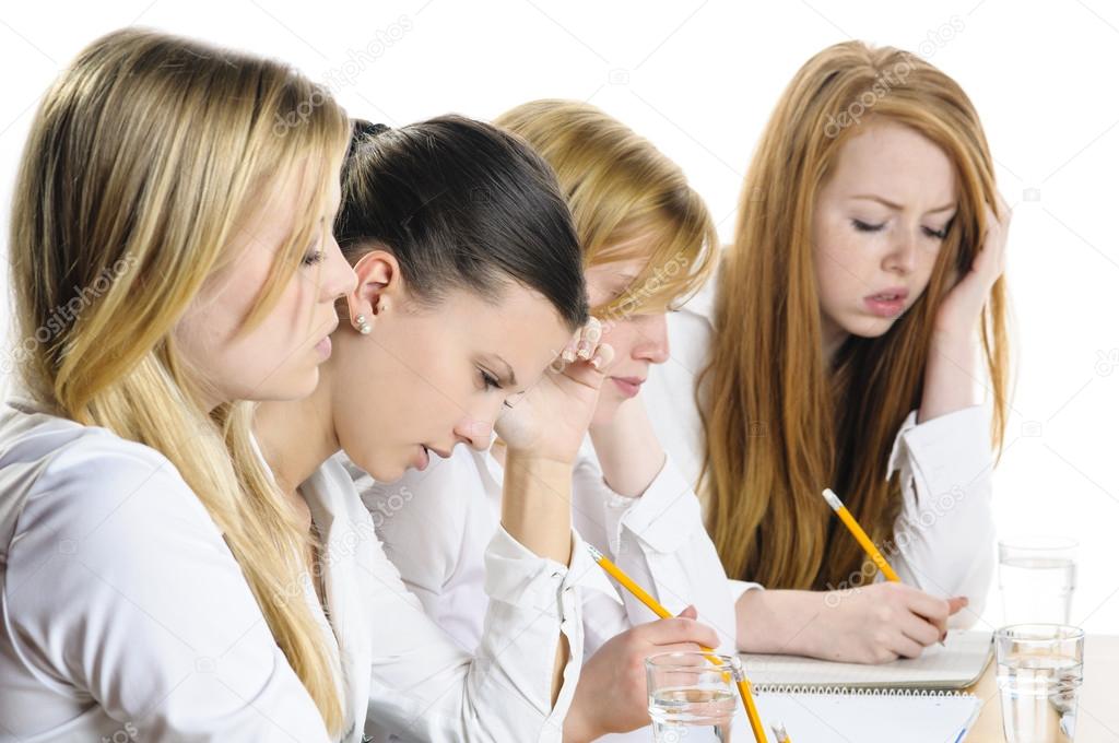 Four Girls writing