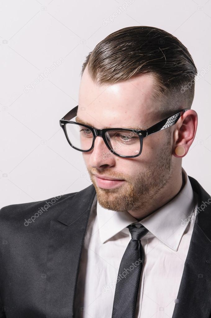 Cool young man with glasses