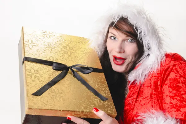 Christmas woman with golden package — Stock Photo, Image
