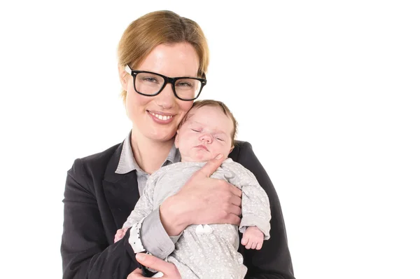 Businesswoman with baby in her arms — Stock Photo, Image