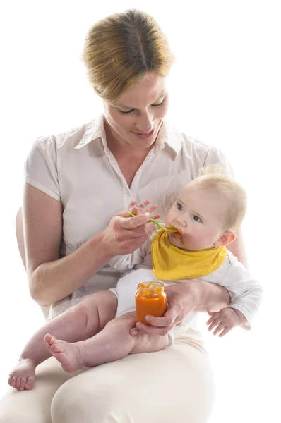 Baby gets porridge — Stock Photo, Image