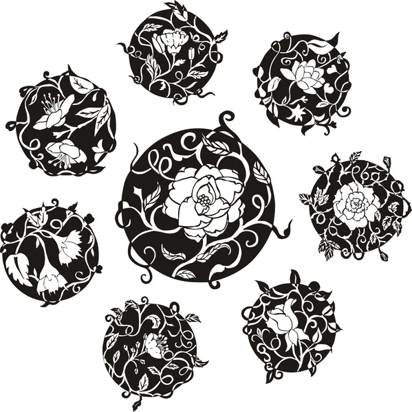 Round decorative flower dingbat designs — Stock Vector