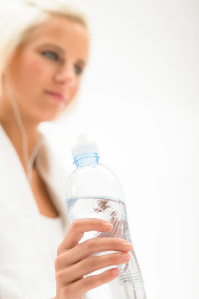 Fitness water bottle woman in background — Stock Photo, Image