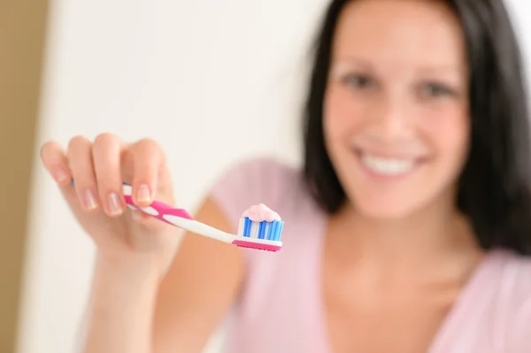 Toothpaste on toothbrush close-up teeth brushing — Stock Photo, Image