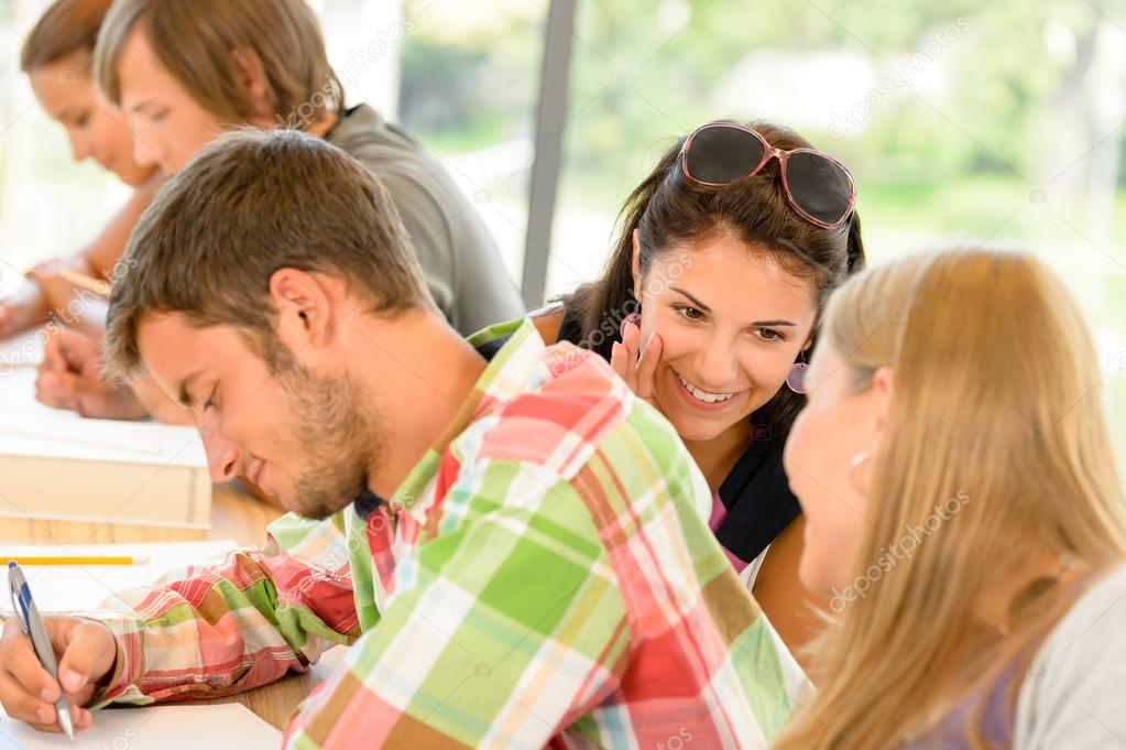 Pupils gossiping behind colleague's back in school