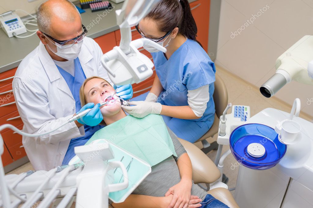 Dental procedure dentist care female patient — Stock Photo