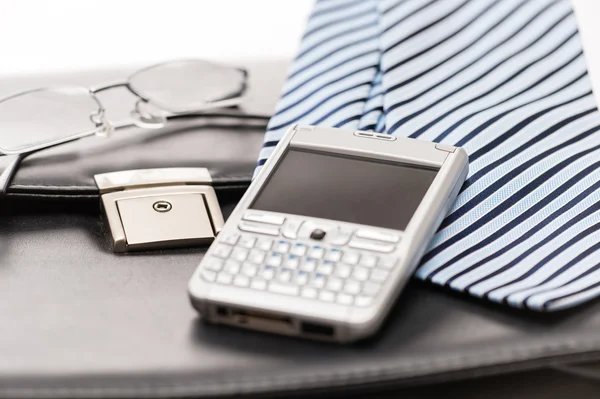 Accessori business uomo cravatta valigetta telefono — Foto Stock