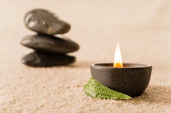 Spa still life candle with zen stones — Stock Photo, Image