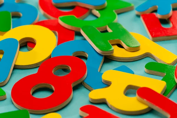 Colored wooden numbers and letters for children — Stock Photo, Image