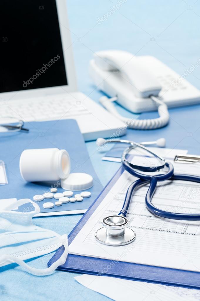 Doctor's office desk with medical accessories Stock Photo by ©CandyBoxImages 16956017