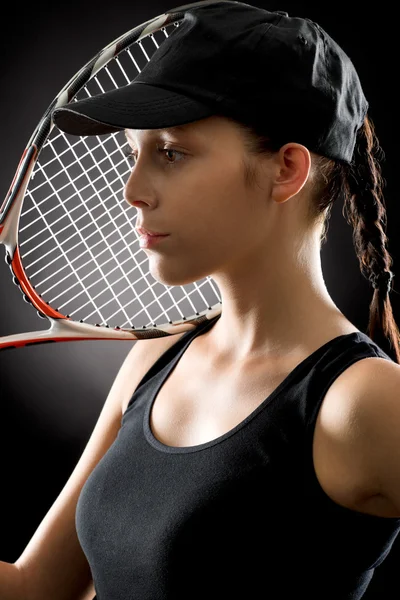 Junge Tennisspielerin mit Schläger — Stockfoto