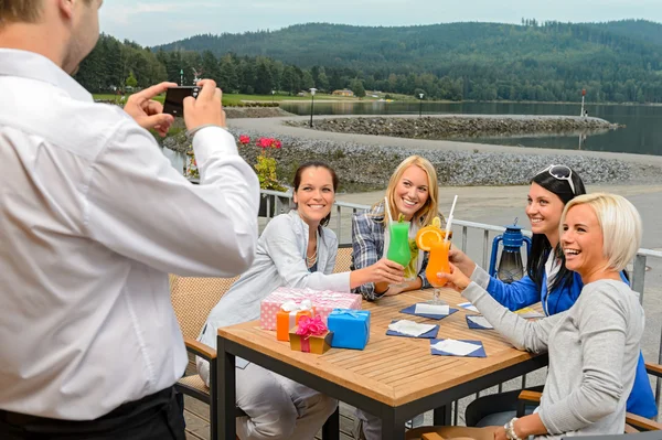 Woman posing for camera at restaurant outdoors Royalty Free Stock Images