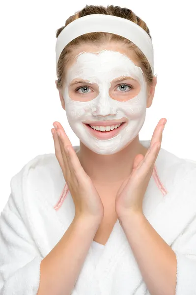 Jovem menina feliz máscara facial cosméticos sorridentes — Fotografia de Stock