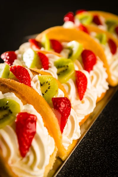 Sponge cake filled with whipped cream — Stock Photo, Image