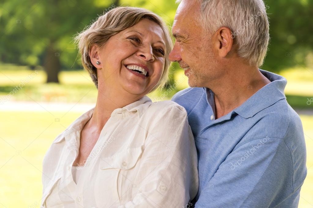 Happy retirement senior couple laughing together Stock Photo by