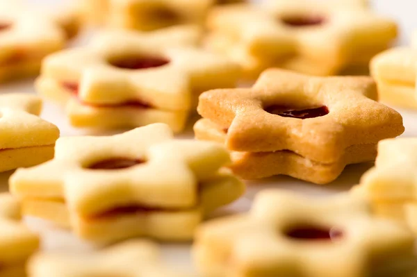 Freshly baked Christmas cookies star with jam — Stock Photo, Image