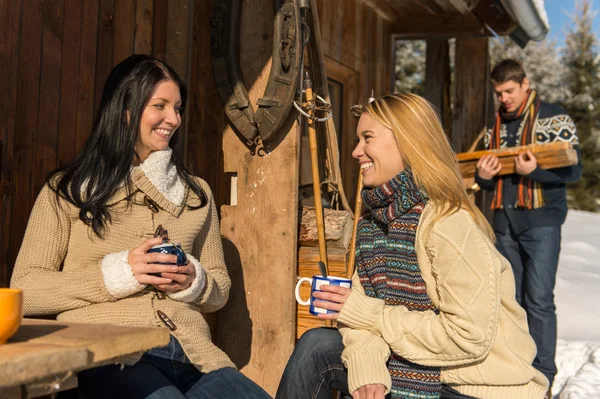 Friends spend holiday winter snow cottage — Stock Photo, Image