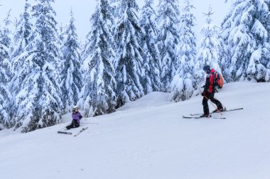 Rescue ski patrol help injured woman skier clipart