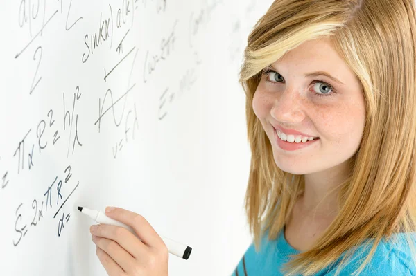 Student teenage girl write mathematics white board — Stock fotografie