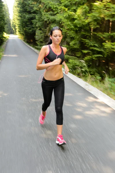 Kvinna kör maraton lopp rörelseoskärpa — Stockfoto