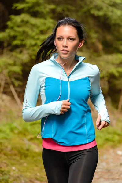 Running woman with headphones outdoor — Stock Photo, Image