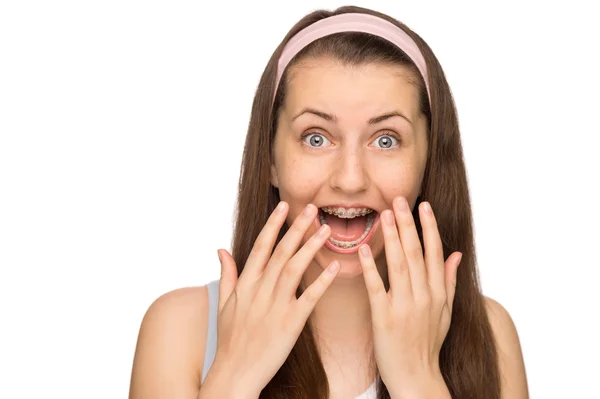 Excited girl with braces shouting — Stock Photo, Image