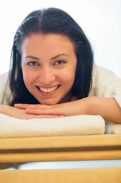 Woman resting on bed at spa — Stock Photo, Image