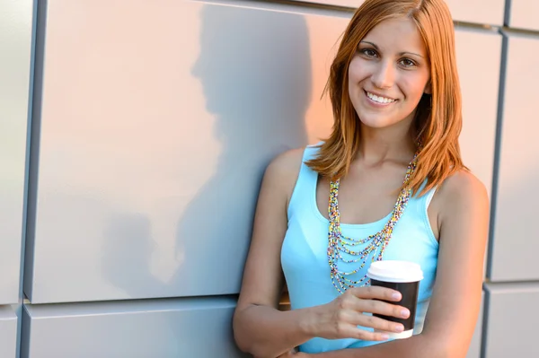 Student girl holding coffee cup — Stock Photo, Image