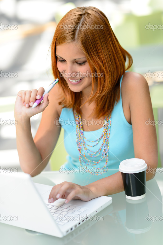 Student girl working on laptop