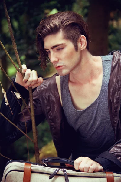 Young man on the road Stock Photo