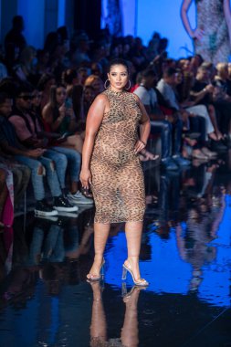 A model walks the runway for Matte Collection Swimwear Fashion Show during Art, Hearts, Fashion Swim Week at the Faena Forum in Miami Beach on 7- 9- 2021