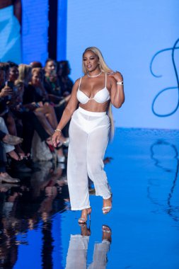 A model walks the runway for Matte Collection Swimwear Fashion Show during Art, Hearts, Fashion Swim Week at the Faena Forum in Miami Beach on 7- 9- 2021