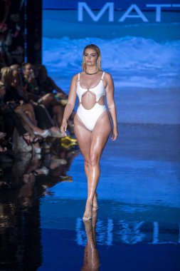 A model walks the runway for Matte Collection Swimwear Fashion Show during Art, Hearts, Fashion Swim Week at the Faena Forum in Miami Beach on 7- 9- 2021