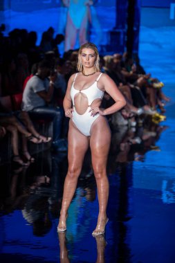 A model walks the runway for Matte Collection Swimwear Fashion Show during Art, Hearts, Fashion Swim Week at the Faena Forum in Miami Beach on 7- 9- 2021