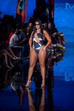 A model walks the runway for Matte Collection Swimwear Fashion Show during Art, Hearts, Fashion Swim Week at the Faena Forum in Miami Beach on 7- 9- 2021