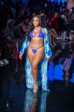 A model walks the runway for Matte Collection Swimwear Fashion Show during Art, Hearts, Fashion Swim Week at the Faena Forum in Miami Beach on 7- 9- 2021