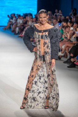 A model walks the runway for The Miami International University of Art and Design Fashion Show during Paraiso Swim Week 2022 at Miami Beach on July 21st, 2022