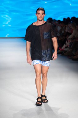 A model walks the runway for The Miami International University of Art and Design Fashion Show during Paraiso Swim Week 2022 at Miami Beach on July 21st, 2022