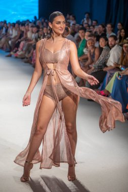 A model walks the runway for The Miami International University of Art and Design Fashion Show during Paraiso Swim Week 2022 at Miami Beach on July 21st, 2022