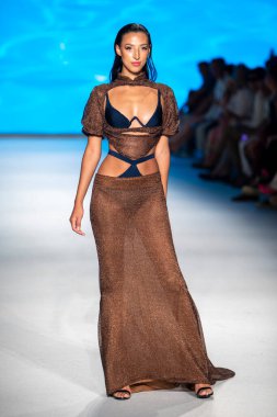 A model walks the runway for The Miami International University of Art and Design Fashion Show during Paraiso Swim Week 2022 at Miami Beach on July 21st, 2022