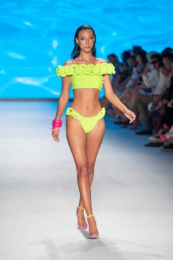 A model walks the runway for The Miami International University of Art and Design Fashion Show during Paraiso Swim Week 2022 at Miami Beach on July 21st, 2022
