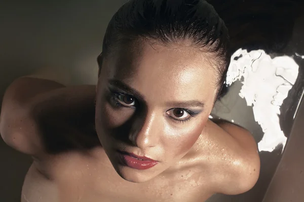 Portrait of a young blonde girl with wet hair — Stock Photo, Image