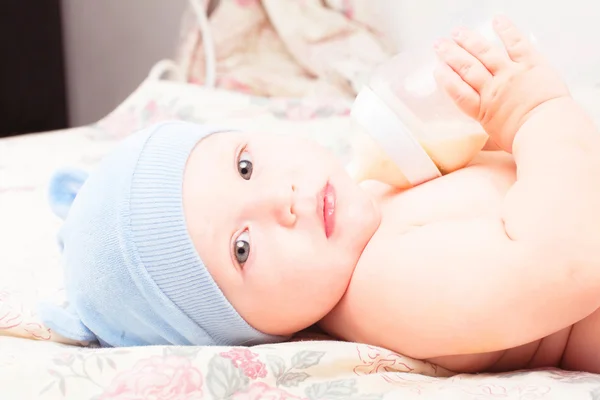 Adorable Baby eating from bottle — Stock Photo, Image