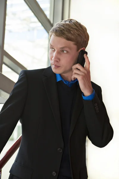 Businessman speaking by telephone and making deal — Stock Photo, Image