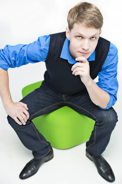 Student sit on green ball and thinking — Stock Photo, Image