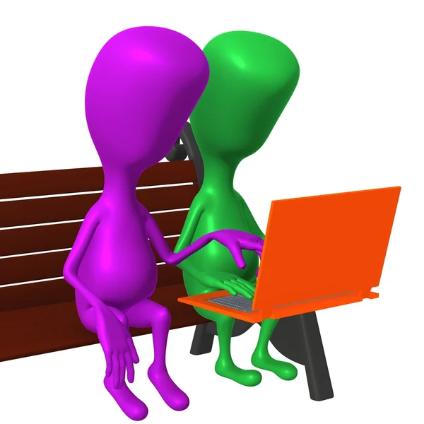 View puppet discuss after laptop on bench — Stock Photo, Image