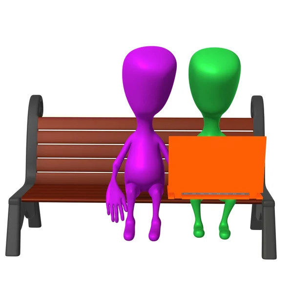 View puppet discuss after laptop on bench — Stock Photo, Image